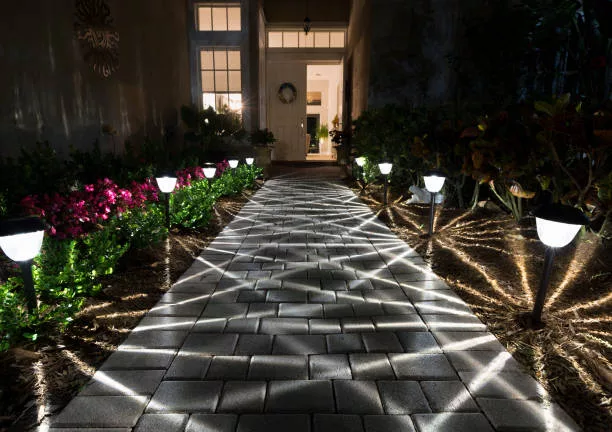 Vero Beach, Florida, USA - April 12, 2021: Illuminated Walkway to Front Door at Nighttime