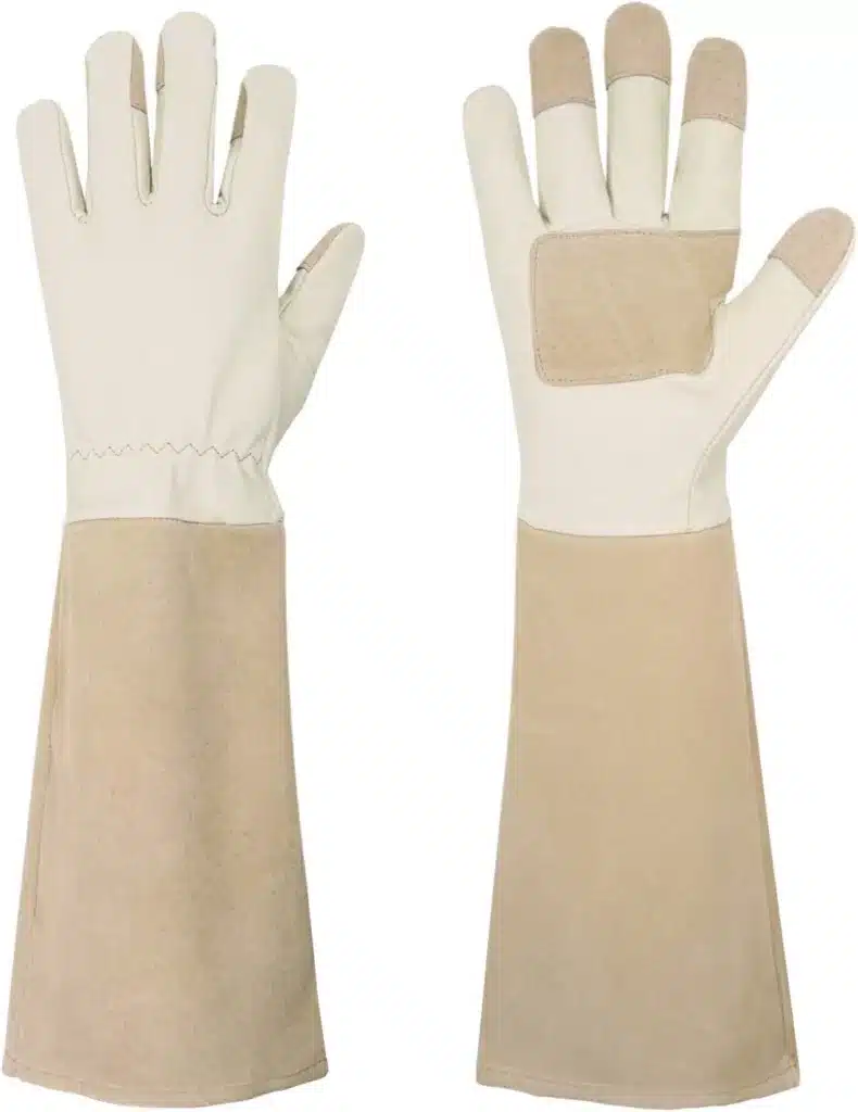 Tan and white long style gaunlet gardening gloves on a white background.